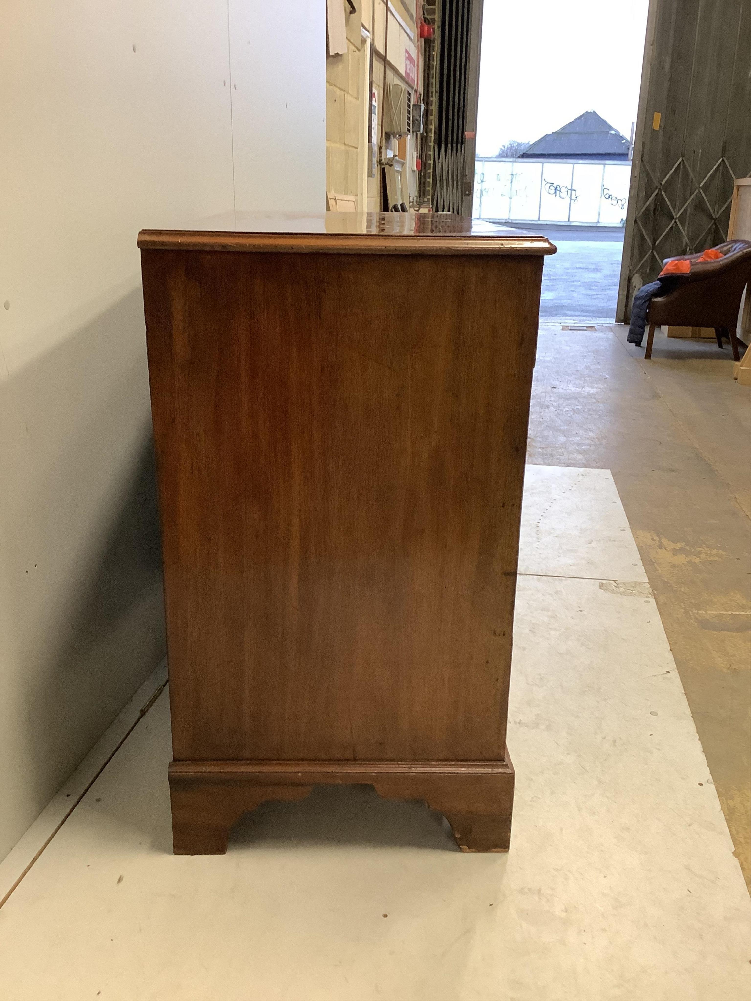 A George III mahogany chest of two short and three long drawers on bracket feet, width 114cm, depth 56cm, height 101cm. Condition - fair